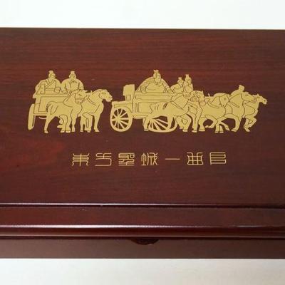 1097	ASIAN GILT METAL TABLETS IN WOOD BOX
