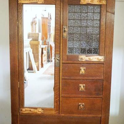 1208	ARTS & CRAFTS STYLE WARDROBE, 2 DOOR, 4 DRAWER, LEAD GLASS DOOR W/ONE CRACKED PANEL, UNIT ALTERED TO DISASSEMBLE IN 3 PIECES,...