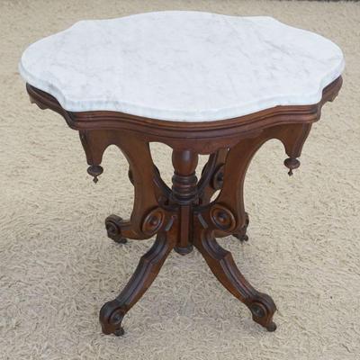 1190	WALNUT VICTORIAN MARBLE TURTLE TOP PARLOR TABLE, APPROXIMATELY 29 IN X 22 IN X 29 IN HIGH
