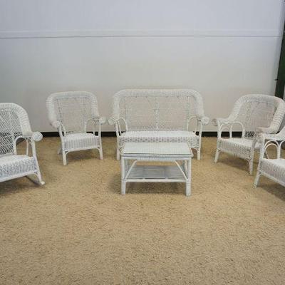 1245	6 PIECE WICKER PORCH SET INCLUDING ROCKING CHIAR, 3 ARMCHAIRS, SETTEE & GLASS TOP TABLE, SOME WEAVING LOSS
