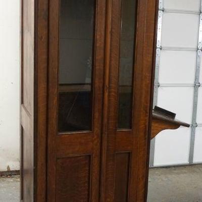 1217	ANTIQUE OAK WESTERN ELECTRIC BELL TELEPHONE BOOTH W/EMBOSSED ORNAMENTAL TIN INTERIOR & BELL TEL LAMP, APPROXIMATELY 31 IN X 43...