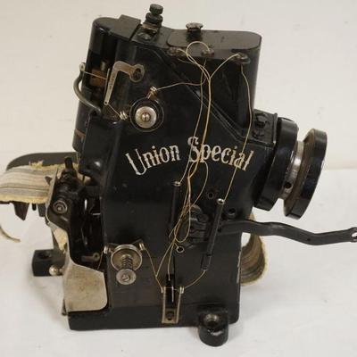 1027	UNION SPECIAL SEWING MACHINE, APPROXIMATELY 10 IN HIGH
