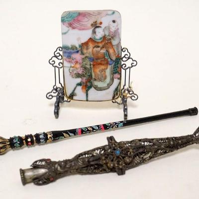 1101	LOT OF SMALLS INCLUDING 2 ORNATE CIGARETTE HOLDERS & SMALL ASIAN PLAQUE IN STAND
