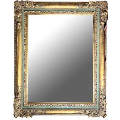 IMPRESSIVE GILT CARVED MIRROR | A gilt carved frame wall mirror with green paint and nice patina, beveled glass. - w. 41.5 x h. 51 in...