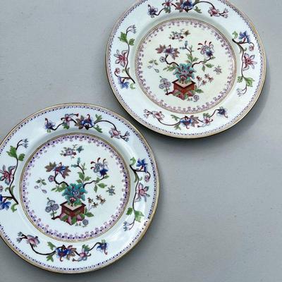 (2PC) CHINOISERIE PLATES | Hand painted enamel decoration of planter and blossoming vines, with easel display stands; faintly impressed...