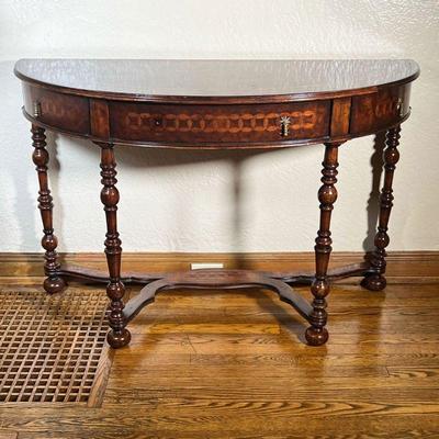 BURL VENEER DEMILUNE TABLE | Jonathan Charles half round console table having a light walnut finish on Burl veneers with hand turned legs...
