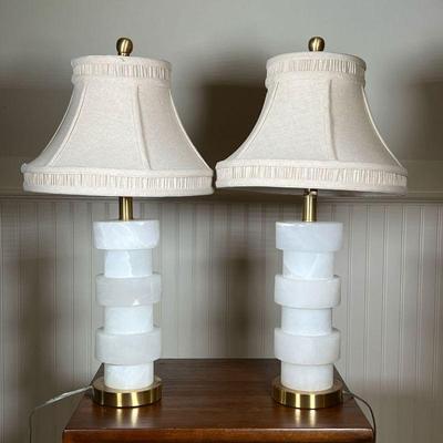 (2PC) PAIR ALABASTER LAMPS | Heavy carved alabaster table lamps with brushed gold bases and textured beige shades. - h. 52.5 x dia. 5 in...