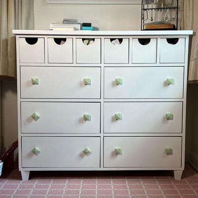 WHITE DRESSER | White pottery barn style dresser with six cubby drawers over six half width drawers with green painted pulls. - l. 46.5 x...