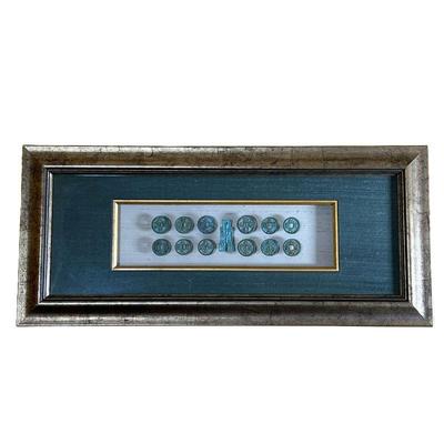 FRAMED CHINESE COINS | Float mounted and matted in a silvered frame. - w. 22.25 x h. 10 in (frame) 