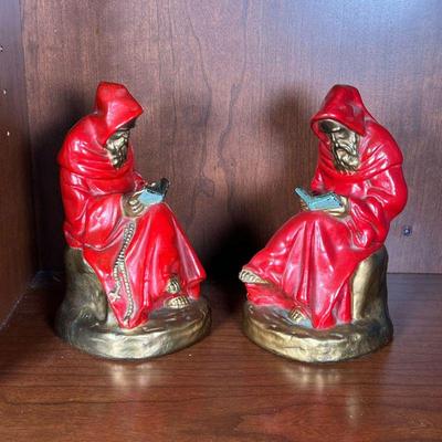 (2PC) ARMOR BRONZE BOOKENDS | Pair of bookends by the Armor Bronze Co., showing robed priestly figures reading, with label on bottom. -...
