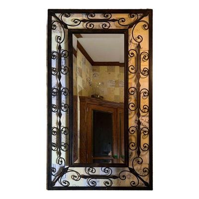 SCROLL FRAME MIRROR | Openwork scrolled metal frame with a beveled glass mirror. - w. 24.5 x h. 42 in (overall) 