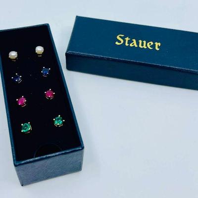 Lot 019-J: Stauer Boxed Earring Set

Includes: Four pairs of stud earrings:
â€¢	Pearl
â€¢	Lab-created sapphire
â€¢	Emerald and Ruby in a...