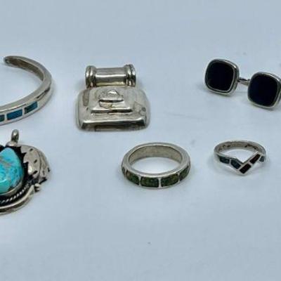 Lot 026-J: Vintage Silver Collection

Features:
â€¢	A collection of vintage, unmarked silver jewelry. Turquoise pendant appears to be...