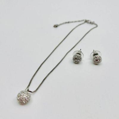 Lot 005-J: Swarovski Necklace and Earrings Set #1

Features: 
â€¢	Swarovski crystal pendant on Rhodium-plated adjustable chain.
â€¢...