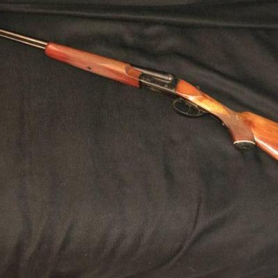 Lot 046-MM: Vintage Blumenfield â€œVolunteerâ€ Shotgun

Features: 
â€¢	.410-gauge magnum (small-bore shotgun)
â€¢	Beaver-tail forearm...