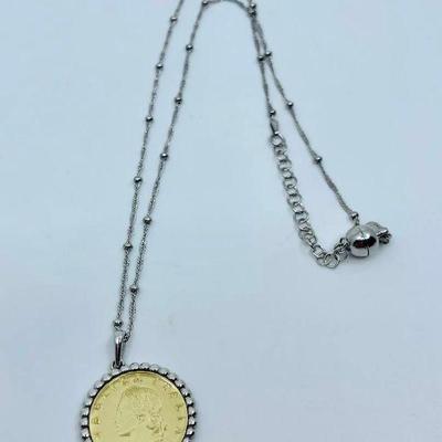 Lot 015-J: Italian Coin Necklace

Features: Italian coin necklace on 20â€ sterling chain


Dimensions: 12g total weight

Condition: Good...