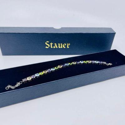 Lot 018-J: Stauer Multi-Gemstone Tennis Bracelet 

Features: 
From Stauer.com: Garnet, citrine, topaz and peridot stones on...