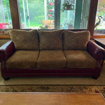 7' Couch - original upholstery with red leather and brass studs - back is red and white striped upholstery