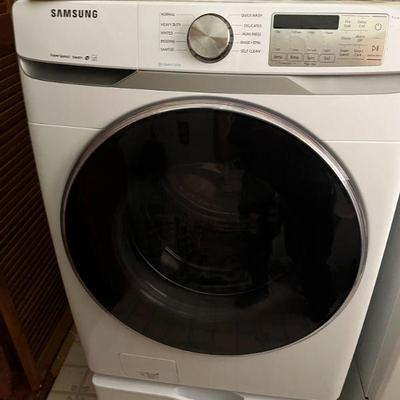 The washer is 1 year old with paperwork