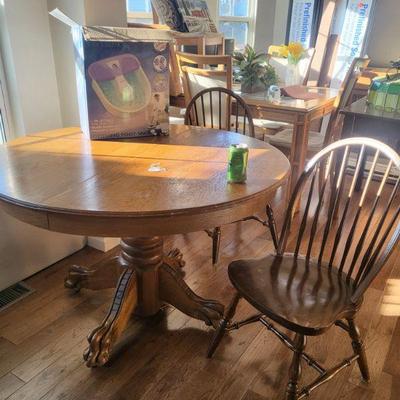 Round table and two Windsor chairs