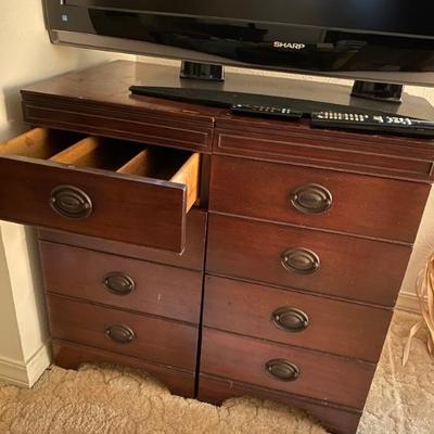 Two four drawer bedside/end tables