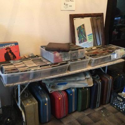 Suitcases, CDs

