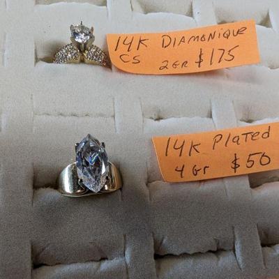 top ring is 14K diamonique CZ $175 Lower ring is 14K plated CZ $50