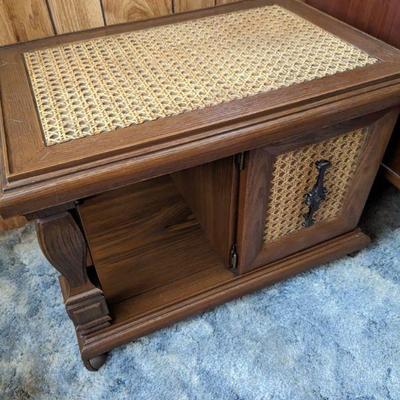 Plastic wood look with rattan top surface rolling cabinet $30