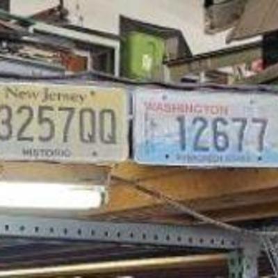 #124 â€¢ 13 License Plates, Various States and Countries
