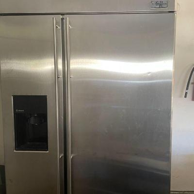 GE Monogram stainless steel refrigerator freezer.  Works great.  Small dent on front.  In garage, ready for pick up $1,850.