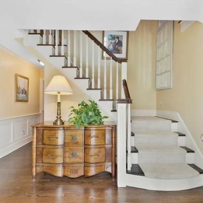 This center entrance colonial provides a welcoming introduction to this home and its furnishings.