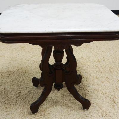 1041	WALNUT VICTORIAN MARBLE TOP PARLOR TABLE, APPROXIMATELY 29 IN X 21 IN X 29 IN H
