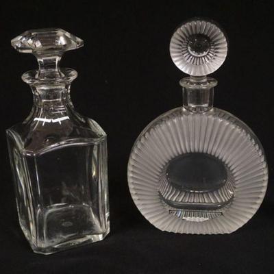 1118	2 DECANTERS INCLUDING BACCARAT	LOT OF 2 DECANTERS, 1 BACCARAT, APPROXIMATELY 10 1/4 IN H
