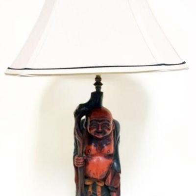 1117	CARVED WOOD FIGURAL LAMP	CARVED WOOD FIGURAL TABLE LAMP OF ASIAN MAN, APPROXIMATELY 31 IN H
