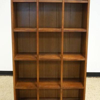 1033	MAPLE NARROW BOOK SHELF DISPLAY WITH 2 DRAWERS AT BASE, APPROXIMATELY 30 IN X 11 IN X 78 IN H
