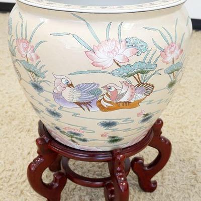 1029	LARGE KOI FISH POT W/WOOD STAND, POT APPROXIMATELY 20 IN X 16 IN HIGH
