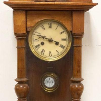 1166	SMALL AUSTRIAN HANGING WALL CLOCK	SMALL AUSTRIAN HANGING WALL CLOCK, KEY WOUND, APPROXIMATELY 6 IN X 10 IN X 27 IN HIGH
