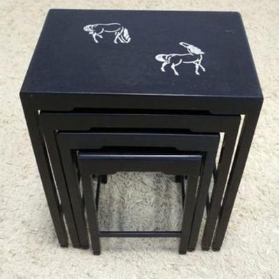1129	NEST OF 4 BLACK LACQUERED TABLES	NEST OF 4 BLACK LACQUERED TABLES WITH INLAID METAL HORSE DESIGN ON TOPS, APPROXIMATELY 21 IN X 14...