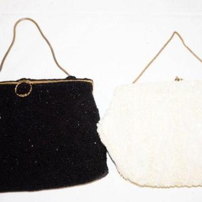 1194	2 BEADED BAGS	2 BEADED BAGS BOTH MADE IN FRANCE, WHITE ONE MARKED JOSEPH
