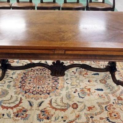 1006	WALNUT DINING ROOM TABLE WITH CARVED LEGS AND STRETCHER BASE, PULL OUT SURFACE LEAVES, APPROXIMATELY 70 IN X 40 IN X 31 IN H, WEAR...