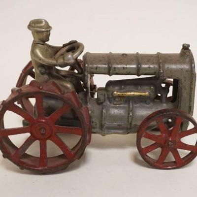 1155	ANTIQUE TOY CAST IRON TRACTOR *FORDSON*	ANTIQUE TOY CAST IRON TRACTOR *FORDSON*, APPROXIMATELY 6 IN X 3 1/2 IN X 5 IN HIGH
