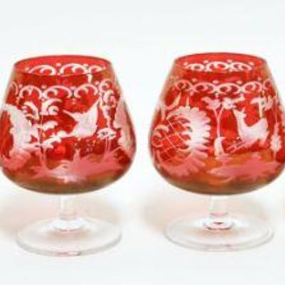1053	RUBY CUT TO CLEAR CORDIAL GLASSES	RUBY CUT TO CLEAR CORDIAL GLASSES, APPROXIMATELY 3 3/4 IN HIGH

