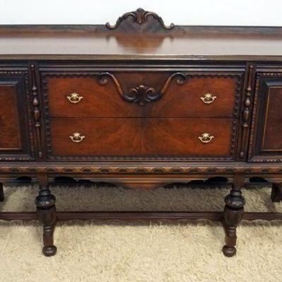 1001	JACOBEAN STYLE SIDEBOARD WITH 2 DOORS AND 2 CENTER DRAWERS, APPROXIMATELY 66 IN X 22 IN X 43 IN H
