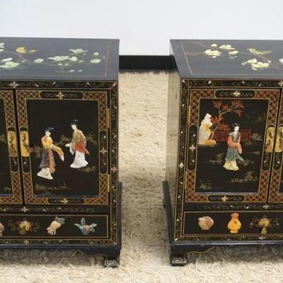 1011	PAIR OF 20TH CENTURY ASIAN 2 DOOR, 1 DRAWER BLACK LACQUERED CABINETS WITH APPLIED CARVED STONE, EACH APPROXIMATELY 22 IN X 16 IN X...