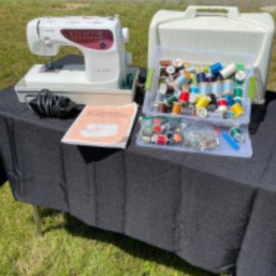 Sewing Machine with Hard Case, Thread and Notions