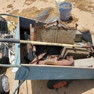 #1170 â€¢ Wheel Barrel with Miscellaneous Items
