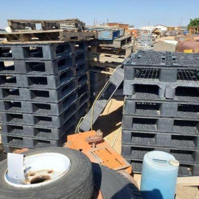 #1208 â€¢ 45 Black Plastic Pallets
