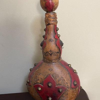 brown red leather liquor decanter