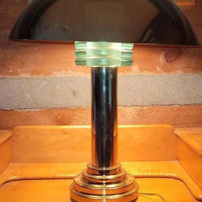 Very heavy green glass and brasstone lamp