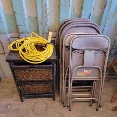 #3068 â€¢ 6 Metal Folding Chairs, Wooden End Table with Wicker Drawers, and Extension Cord
